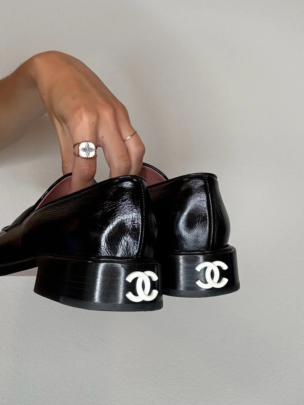 CHANEL Black Patent Leather Loafers with White CC Heel Accents